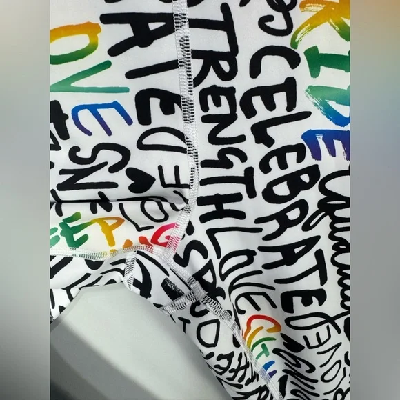 NWOT ATHLETA ELATION TRAIN 7/8
Tight Leggings PRIDE Graffiti words L - Picture 8 of 13